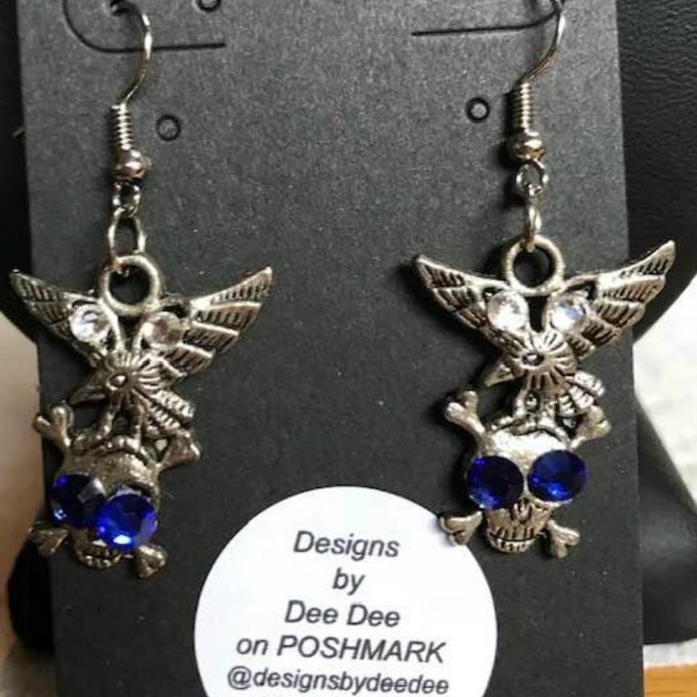 The Skeleton Earrings w Blue Eyes